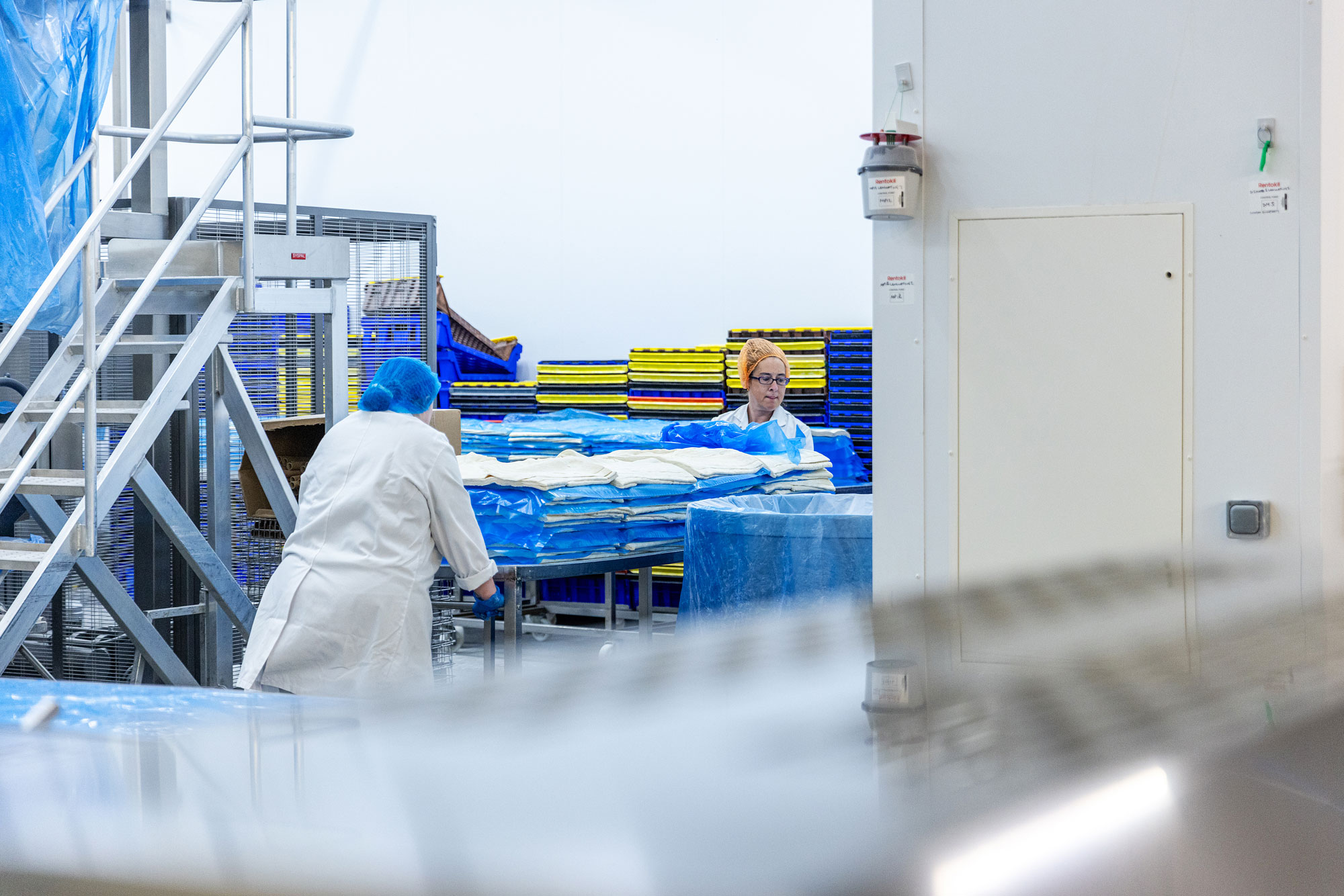 Pin-It team members on the production line