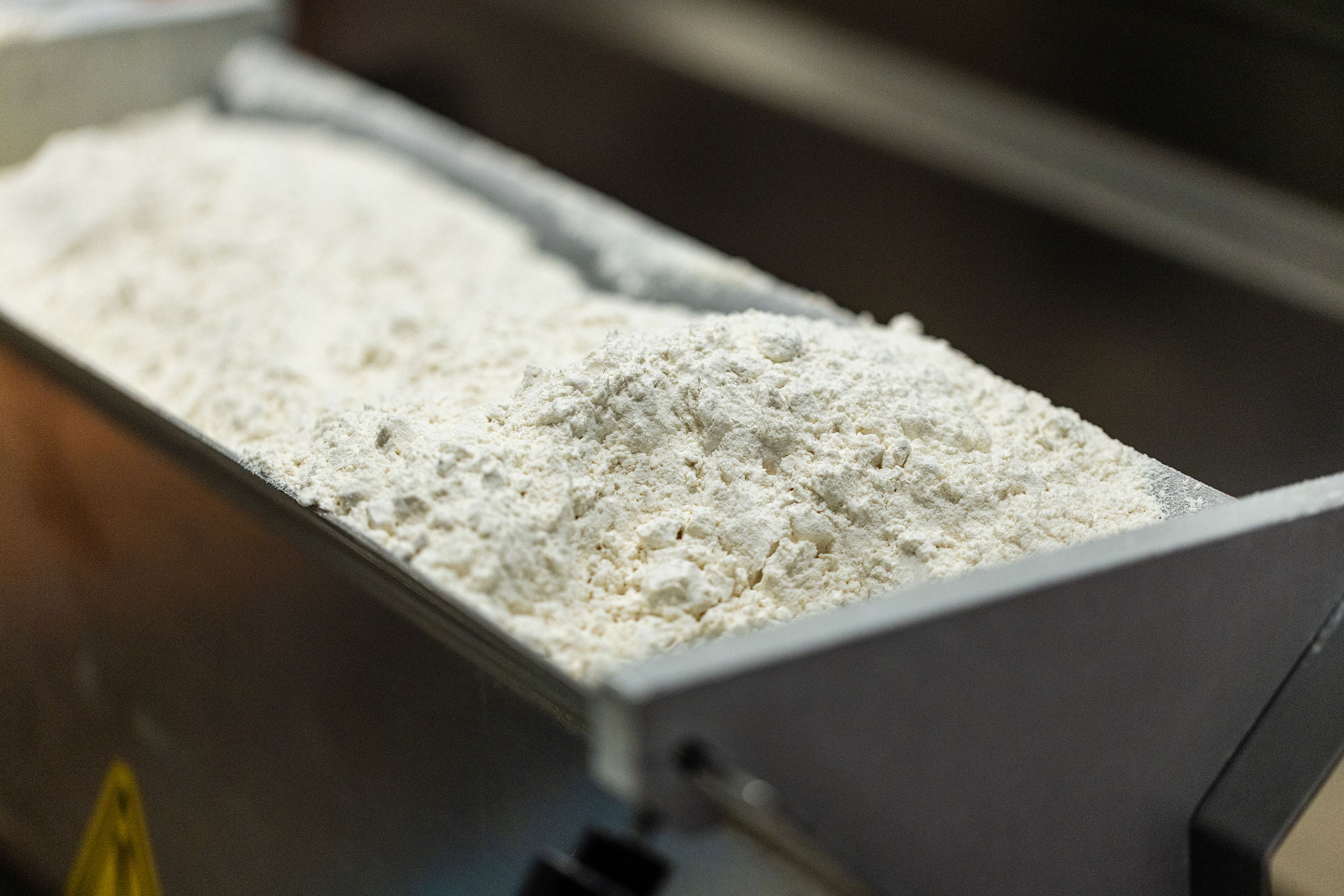 Flour being loaded for pastry dough